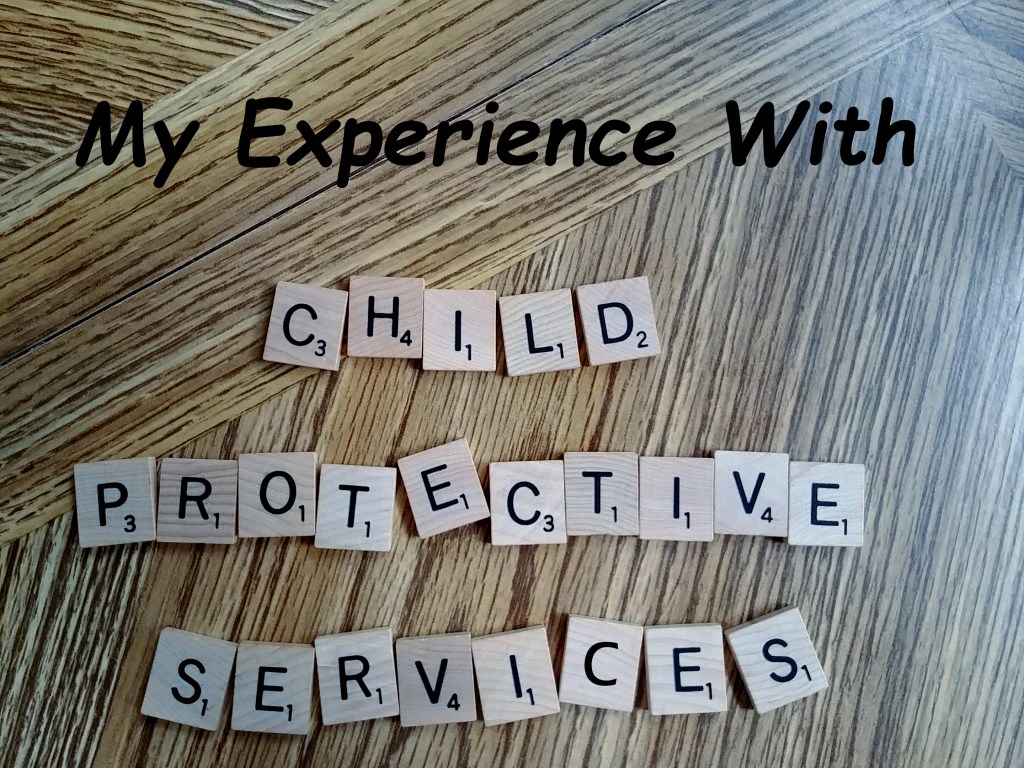 Child Protective Services spelled out with scrabble letters on wood table
